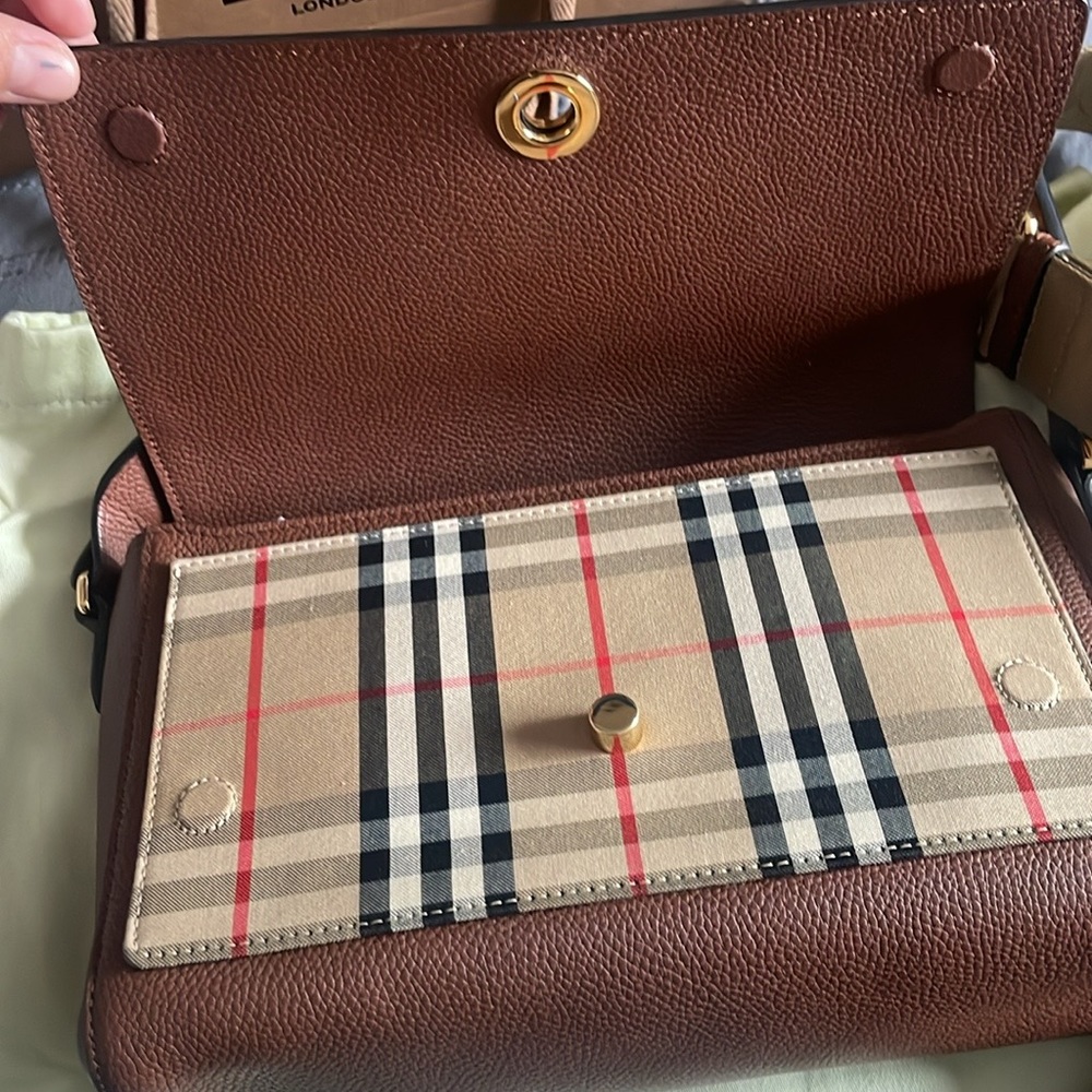 Burberry cross body bag. Tan color. Only used two times .